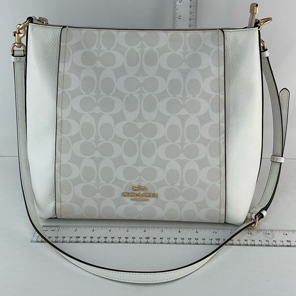Coach Marlon Hobo In Signature Canvas
